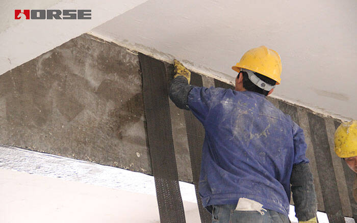 Beam strengthening with unidirectional carbon fiber fabirc Beam strengthening with unidirectional carbon fiber fabirc