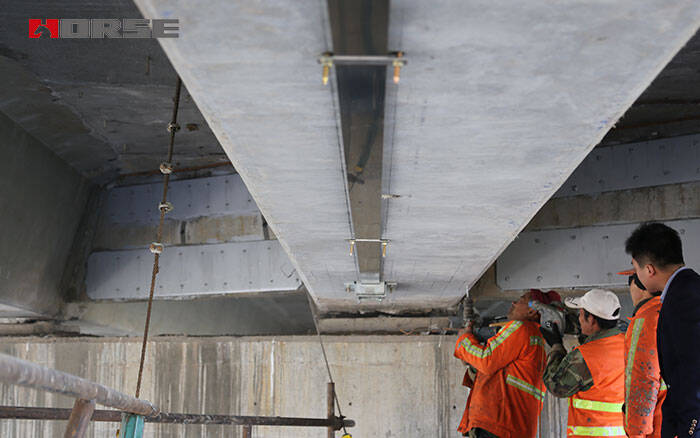 Prestressed FRP plate for strengthening bridge