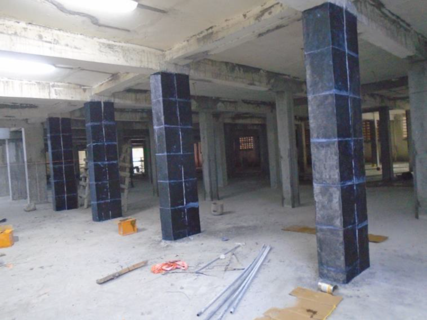 Rehabilitation of Columns of Warehouse with Carbon Fiber