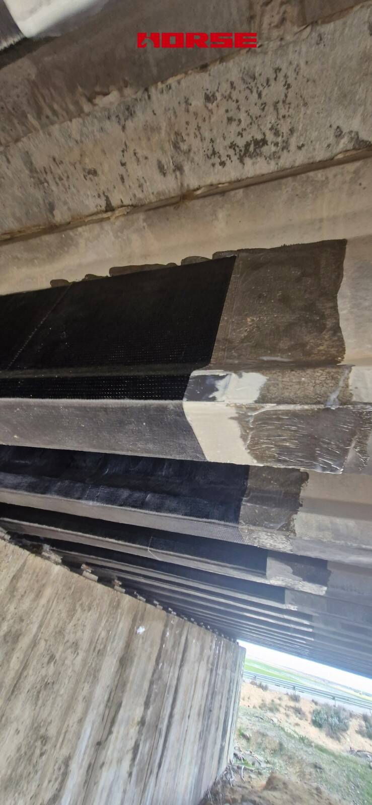 Strengthening of a Prestressed Concrete Multi-Girder Bridge with CFRP Laminate and U-warp Strengthening of a Prestressed Concrete Multi-Girder Bridge with CFRP Laminate and U-warp