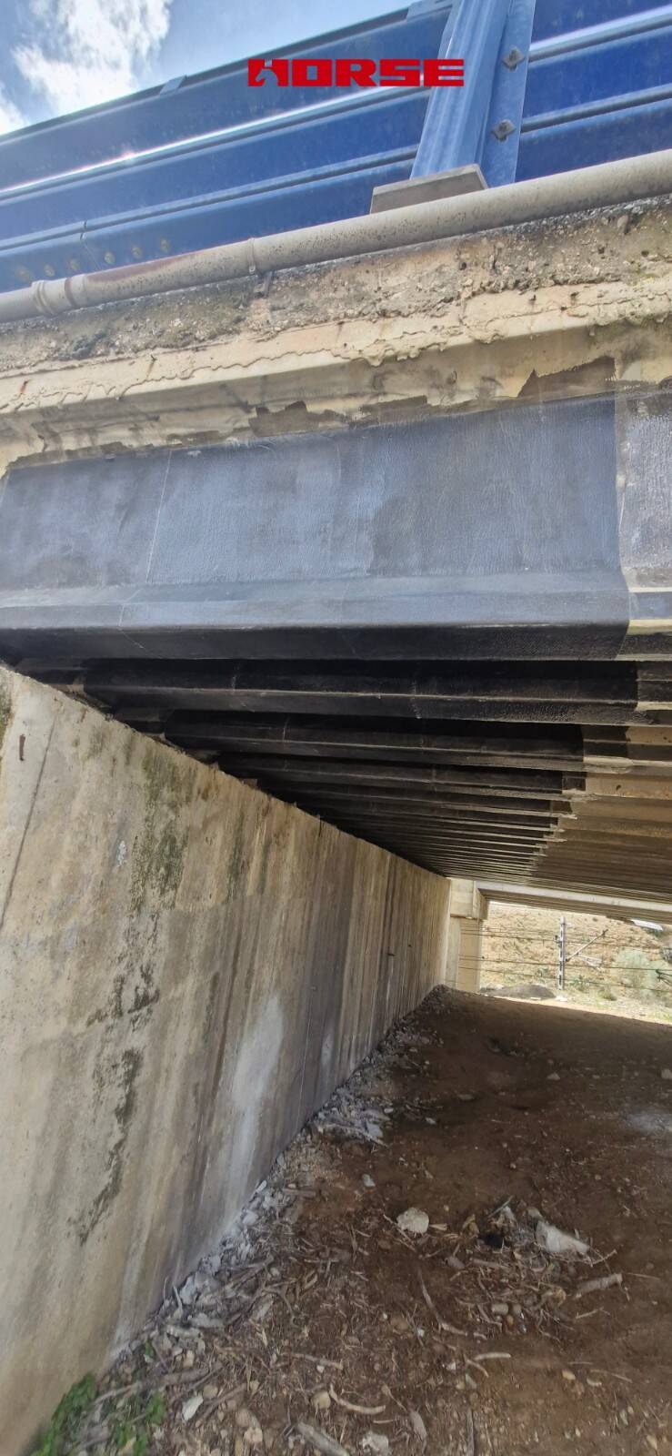 Strengthening of a Prestressed Concrete Multi-Girder Bridge with CFRP Laminate and U-warp Strengthening of a Prestressed Concrete Multi-Girder Bridge with CFRP Laminate and U-warp
