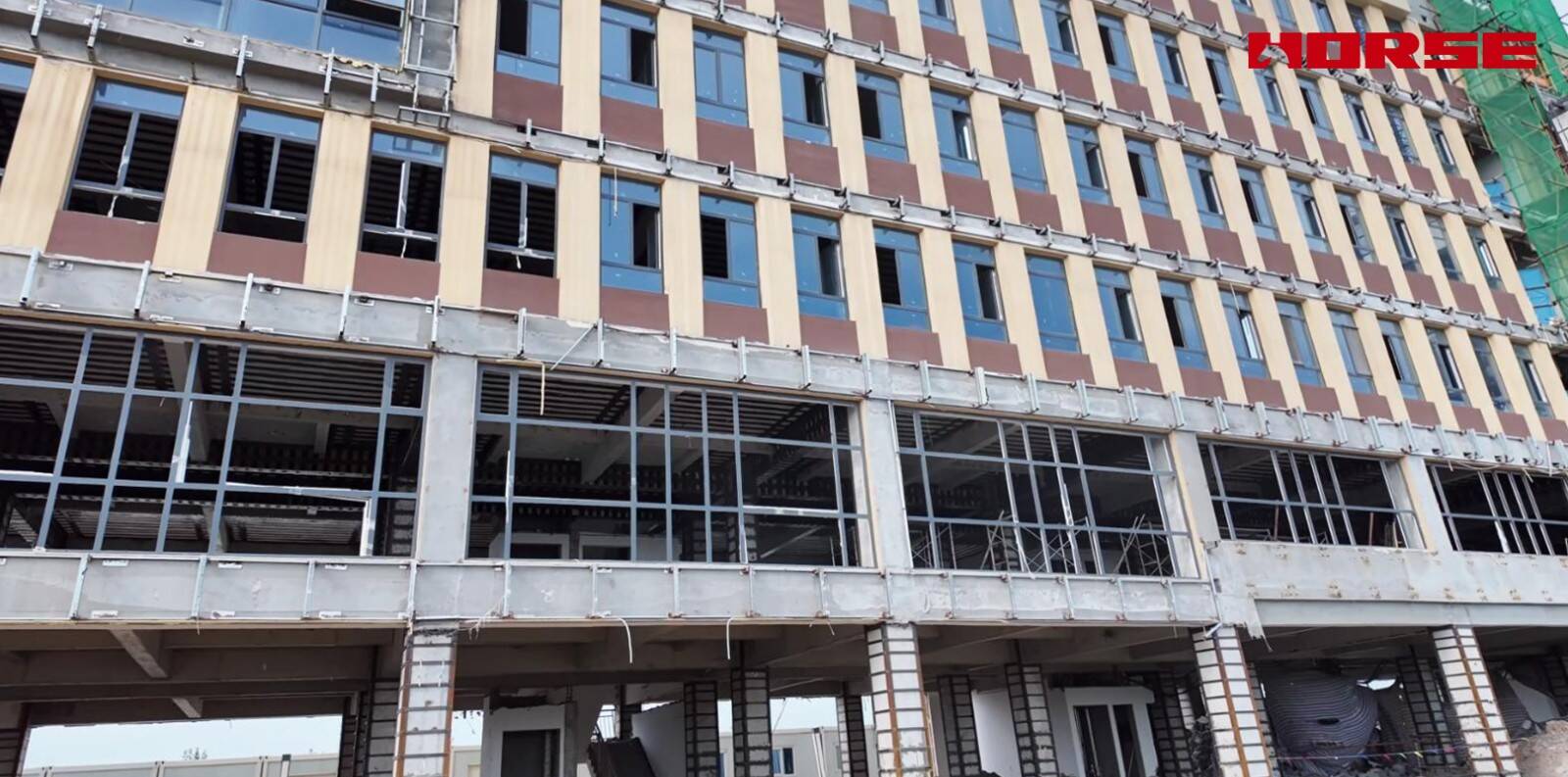 Structural Retrofit for Commercial-to-Senior-Care Conversion -- Carbon Fiber & Steel Jacketing