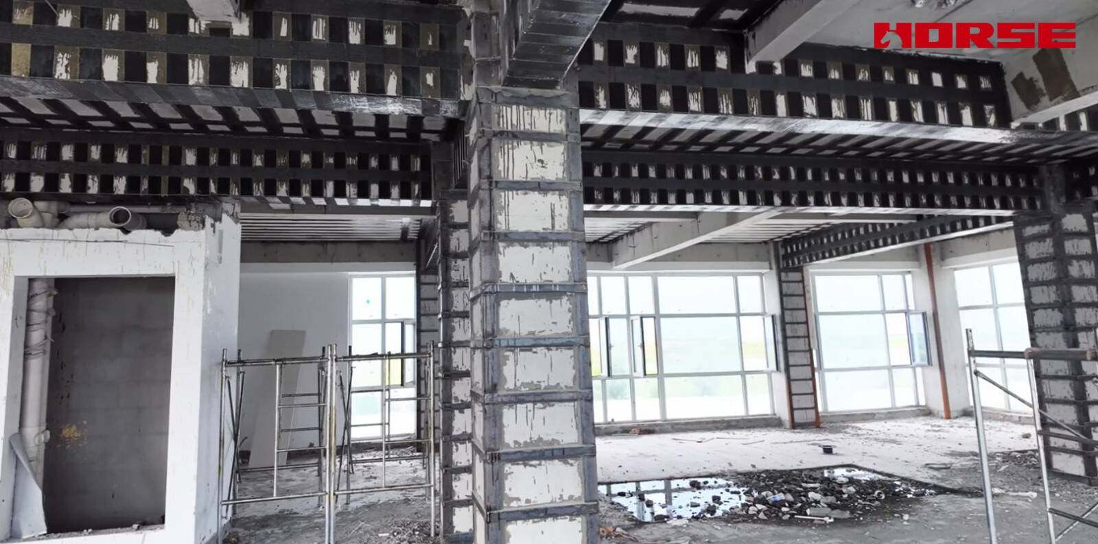 Structural Retrofit for Commercial-to-Senior-Care Conversion -- Carbon Fiber & Steel Jacketing