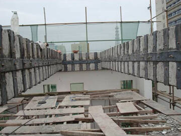 Application of gluing steel plate method to bridge reinforcement