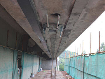 Bridge doctor-prestressed FRP laminate reinforced bridge